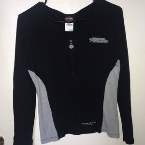 Quarter length Harley Davidson tee.